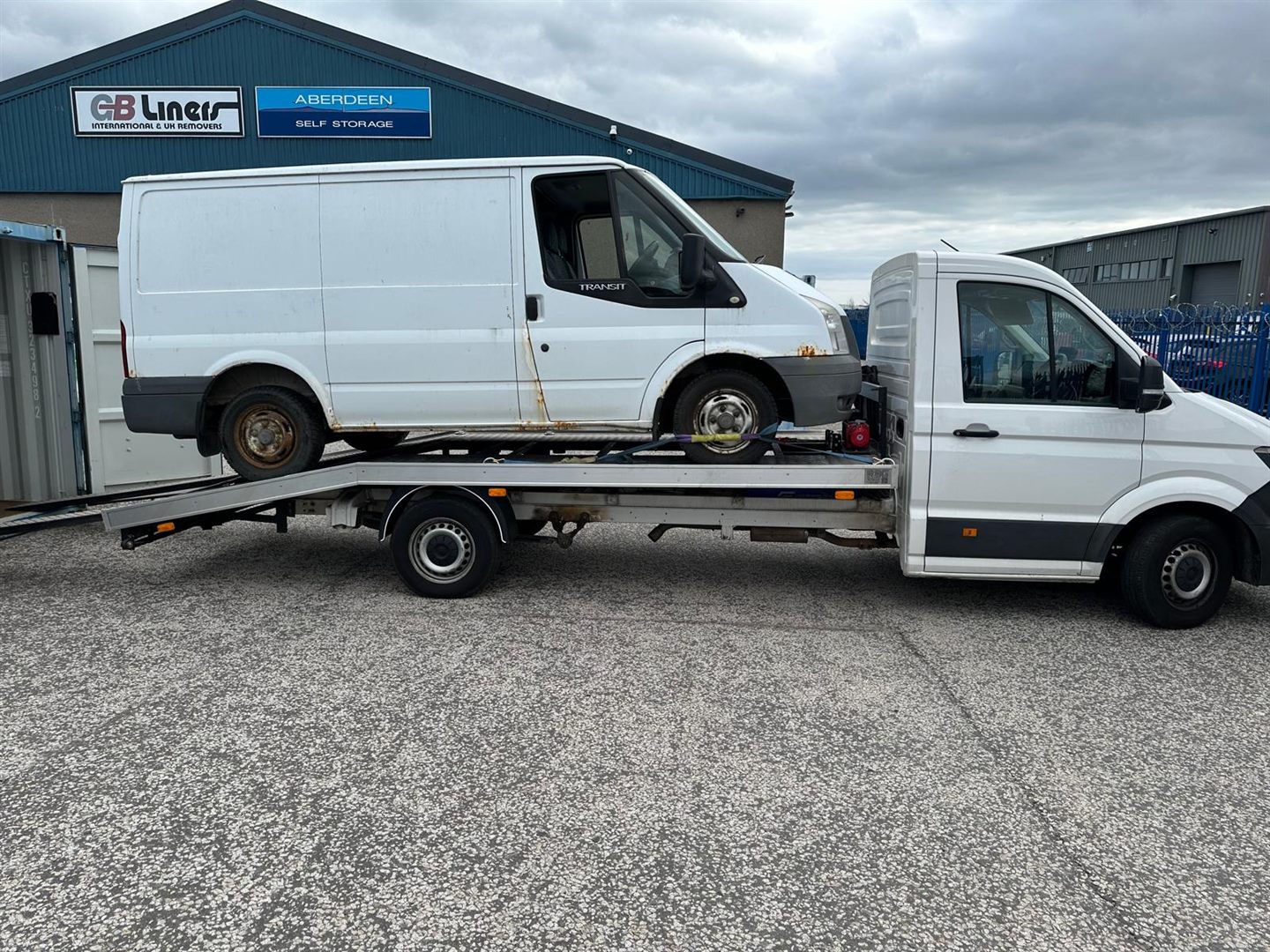 ZRG truck carrying a small white van